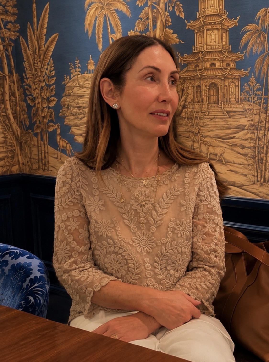 Lisa Merkatz with clients reviewing fabric samples